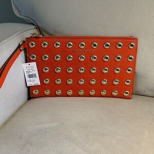 Michael Kors Orange Clutch with Gold Studs